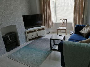 Seaside 2 bed terraced house with garden